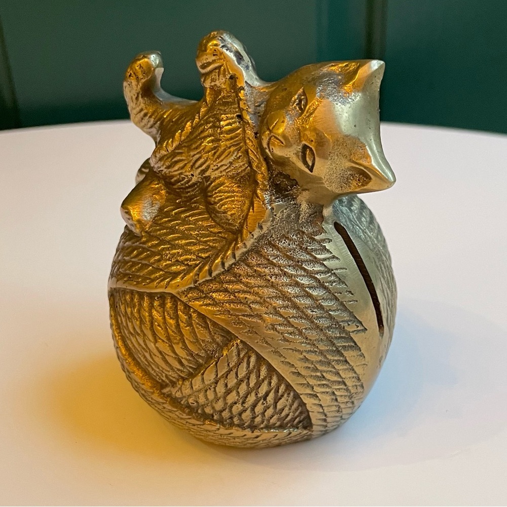 Brass cat and ball of yarn coin bank